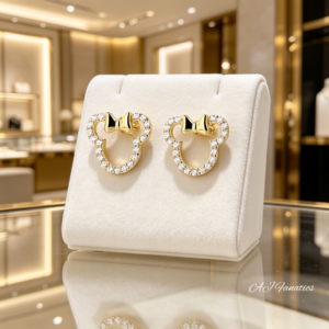 Beary Small Bowtie Stud Earrings in 925 silver, gold plated, outlined with white gems in a petite bear silhouette and bow design.