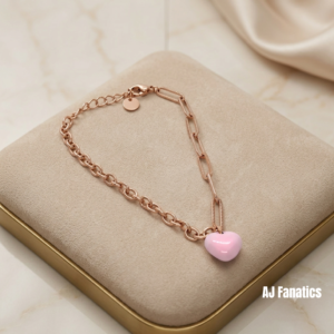 Candy Heart Charm Bracelet in pink and rose gold-plated stainless steel, featuring modern links and a glossy pink heart charm.