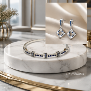 silver bracelet and earring gift set – a sleek silver bangle and geometric drop earrings accented with deep blue sapphire stones, bringing modern elegance and refined sparkle to every occasion.